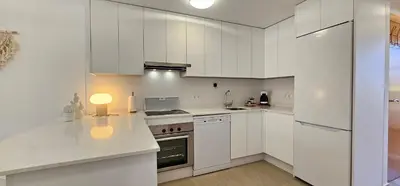 Una cocina o zona de cocina en Homes of Spain, Apartamentos Paraíso Vera Playa, Fatu Hiva, Bajo A con piscina privada en jardín privado, PRIMERA LINEA de PLAYA, WIFI