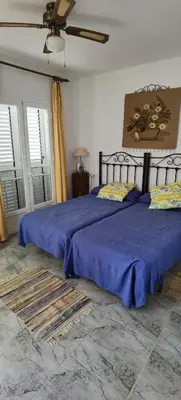 Cama o camas de una habitación en Duplex en urbanización con piscina comunitaria y wifi