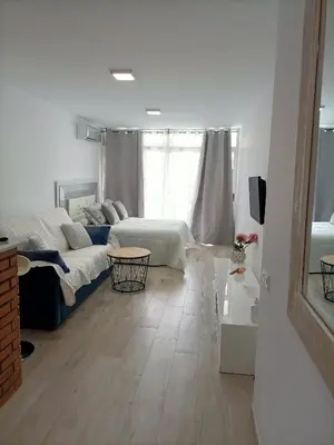 Cama o camas de una habitación en Estudio en la Urbanización de Roquetas de Mar