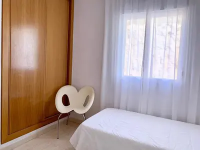 Cama o camas de una habitación en Panoramic Sea Views with Balcony, Air Conditioning and Parking