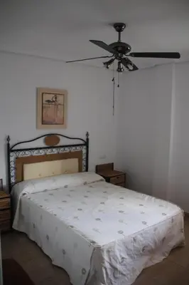 Cama o camas de una habitación en Apartamento en primera línea de playa, con vistas a la playa y con wifi