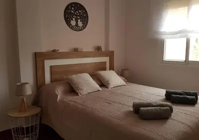 Cama o camas de una habitación en Vera Playa Naturista PLENO SOL