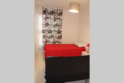 Cama o camas de una habitación en Bonito apartamento en primera línea de campo de golf y vistas al mar