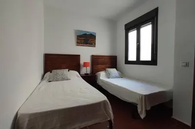 Cama o camas de una habitación en Casa Kenya: Dúplex con azotea y magníficas vistas.