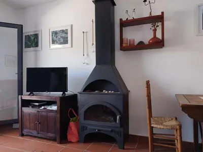 Una televisión o centro de entretenimiento en Casa Kenya: Dúplex con azotea y magníficas vistas.