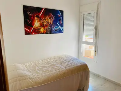 Cama o camas de una habitación en Encantador ático con chimenea y piscina en Almería