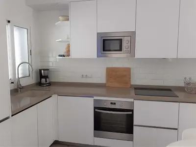 Una cocina o zona de cocina en Precioso Apartamento a 20 metros del mar