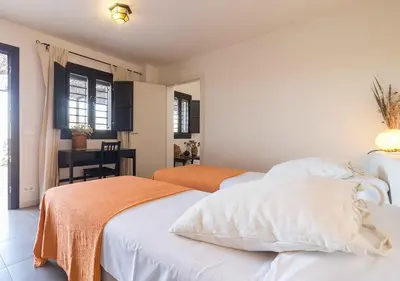 Cama o camas de una habitación en Cortijo La Tenada Cabo de Gata