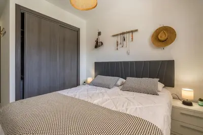 Cama o camas de una habitación en Palmera