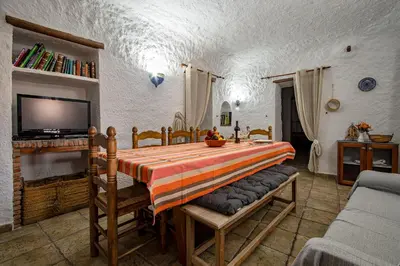 Cama o camas de una habitación en Alojamiento Cuevas Victoria
