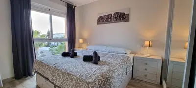 Cama o camas de una habitación en Homes of Spain, Apartamentos Paraíso, Ed Palmerston, Atico O, Suite con Piscina Privada en solárium, vistas al mar, a 50 m de la playa, WIFI