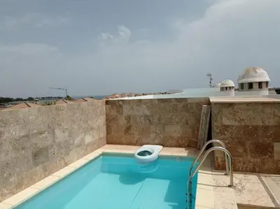 Piscina en o cerca de Homes of Spain, Apartamentos Paraíso, Ed Nuku Hiva, Atico H con Piscina Privada en solárium, a pie de playa, WIFI