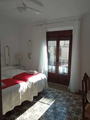 Cama o camas de una habitación en Casa cueva rural Vico, ideal grandes grupos