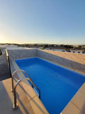 Piscina en o cerca de Ático dúplex en primera línea con piscina privada!