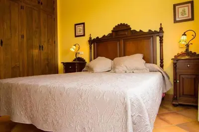 Cama o camas de una habitación en 16:9 Villa Agua Amarga
