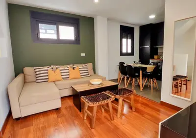 Zona de estar de Apartamentos LOS GATA GATA
