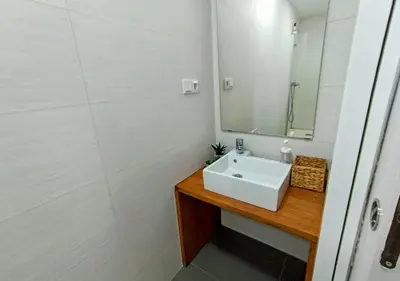 Un baño de Apartamentos LOS GATA GATA