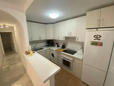 Una cocina o zona de cocina en Apartamento Familiar Torre del Rayo