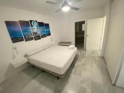 Cama o camas de una habitación en Apartamento Familiar Torre del Rayo