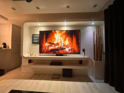 Una televisión o centro de entretenimiento en Bungalows del Golf Almerimar