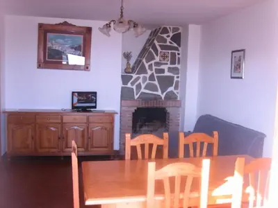 Una televisión o centro de entretenimiento en Alojamiento Rural Mirador del Avellano