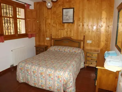 Cama o camas de una habitación en Alojamiento Rural Mirador del Avellano