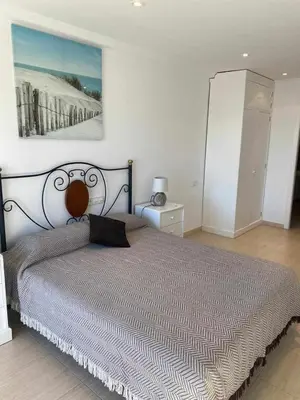 Cama o camas de una habitación en Apartamento magnificas vistas al mar