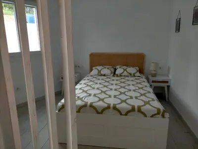 Cama o camas de una habitación en Precioso loft con piscina comunitaria