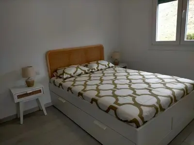 Cama o camas de una habitación en Precioso loft con piscina comunitaria