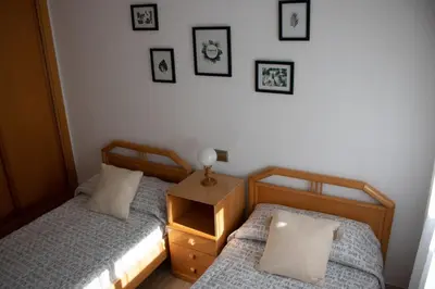 Cama o camas de una habitación en Apartamento céntrico y acogedor
