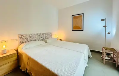 Cama o camas de una habitación en Flamingo Mojácar - Precioso 2 dormitorios en Macenas Resort, con vistas al mar y piscina