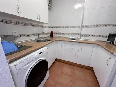 Una cocina o zona de cocina en Atico con vistas al mar