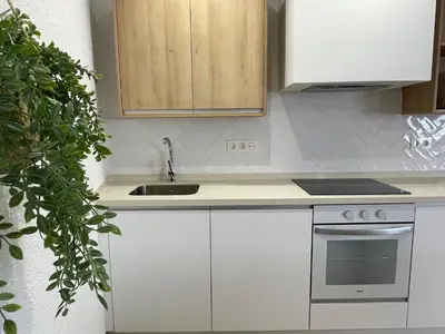 Una cocina o zona de cocina en Lux&Cool Paseo Marítimo San José