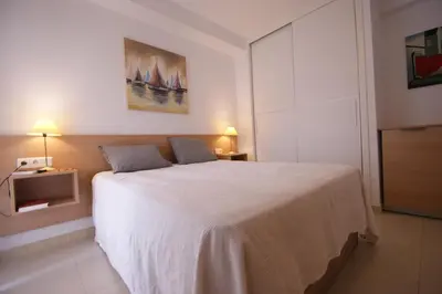 Cama o camas de una habitación en Apartamento en Vera a 300 m de la playa, con patio y salida directa a calle