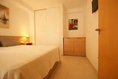 Cama o camas de una habitación en Apartamento en Vera a 300 m de la playa, con patio y salida directa a calle