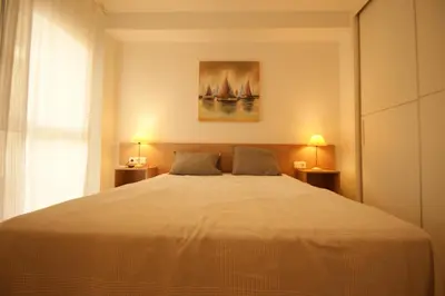 Cama o camas de una habitación en Apartamento en Vera a 300 m de la playa, con patio y salida directa a calle