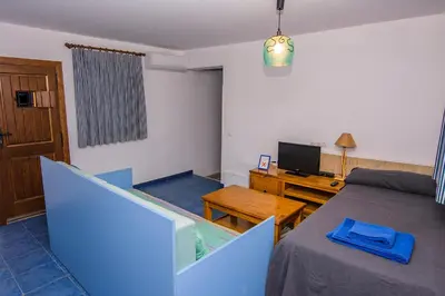 Una televisión o centro de entretenimiento en Cortijo 4 Elementos