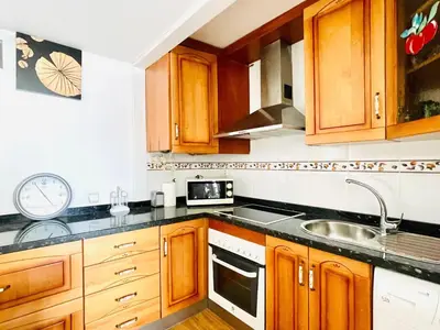 Una cocina o zona de cocina en Seafront apartment in La Garrofa near the beach