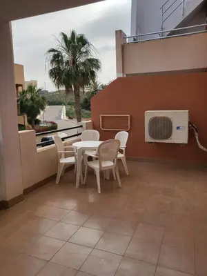 Un balcón o terraza de ¡Apartamento en primera línea con terraza y cerca de la piscina comunitaria!