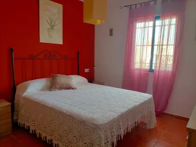 Cama o camas de una habitación en Apartamento con encanto, terraza y parking cubierto