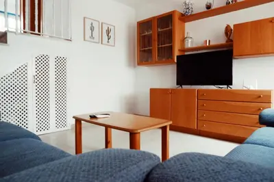 Una televisión o centro de entretenimiento en Casa Iqui