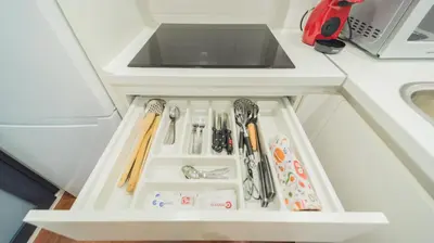 Una cocina o zona de cocina en Expoholidays - Apartamentos Rueda Lopez