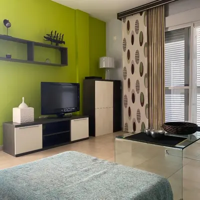 Una televisión o centro de entretenimiento en Residencial Oasis