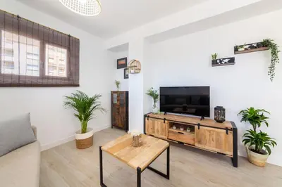 Una televisión o centro de entretenimiento en Apartamento Faro 1
