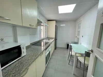 Una cocina o zona de cocina en Apartamentos Valparaiso II