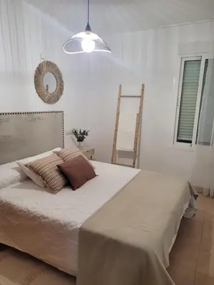 Cama o camas de una habitación en Piso céntrico en 2° línea de playa