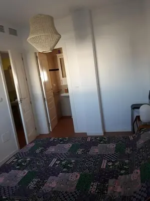 Cama o camas de una habitación en Ático con terraza en el Toyo