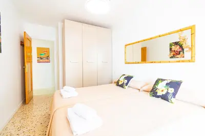 Cama o camas de una habitación en Segunda Linea de Playa, céntrico y equipado - by Aloha Palma