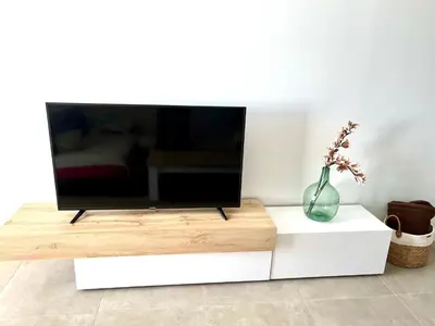 Una televisión o centro de entretenimiento en Apartamento en Mojácar en 1° línea de playa