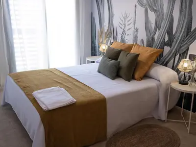 Cama o camas de una habitación en Apartamentos Brisas del Puerto de Aguadulce